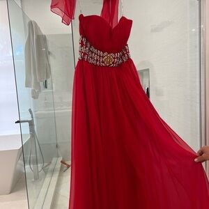Elegant Red Strapless Gown with Embellished Waist